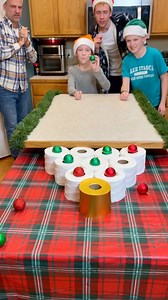 2.3M views · 38K reactions | The Christmas Toilet Paper Challenge 炙 Dad, kids, and the family play funny Christmas party game where they roll ornaments into rolls of toilet paper for cash prizes. Whoever rolls their Christmas tree ornament into the golden toilet paper, wins a special prize. This video was produced by Benson Family, Network Media, and Benson Bros. | Aaron’s Family | Facebook