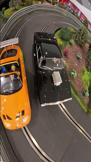 Who will win this EPIC Scalextric battle?