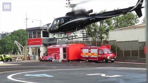 Cruising Away!: Tom Cruise pilots his helicopter out of London