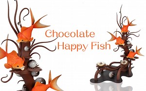 Chocolate happy fish This chocolate showpiece present a typical scene of summer in southern cities of China. The fishes play happily among the lotus and lily pads. Enjoy! @zhaokai_chocolate_academy #chocolate #chocateshowpiece #chocolatesculpture #foodporn #江南 #zhaokaichocolateacademy #kriszhaokai #nevergiveup | Kris Zhaokai