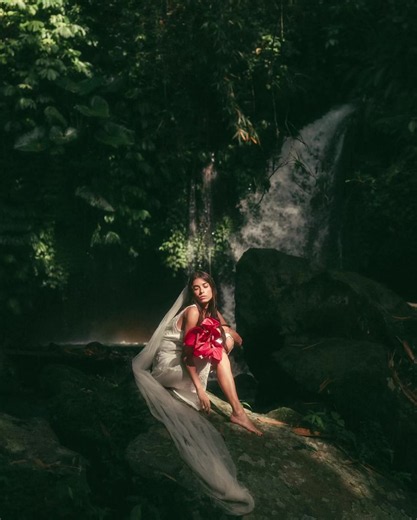 I thought it would be fun to make a post that was a blend of my final work plus the behind the scenes of what all was happening to bring the art to life! I spent the day before searching for the perfect waterfall, something that was relatively quick to access but not on the tourist radar, that got enough sunlight from the correct direction, that was easy to walk around and not so huge that the spray was too intense to shoot in. A scooter ride up a mountain, a trek through some rice fields and do