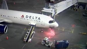 Delta plane catches fire at gate, prompts mass evacuation
