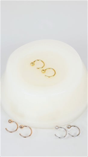 No more hassle! With these Little Ball Huggies Hoops, it's as easy as pop, twist, and you're off to steal the show! | Jcojewellery