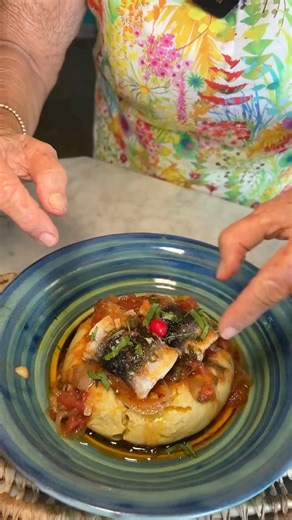 If you haven't tried cou-cou and flying fish, can you truly say you've visited Barbados? 😉 From the very first bite, you'll understand why cou-cou and flying fish hold a special place in the hearts of every Barbadian. 🇧🇧💛 It's more than just a meal; it's a taste of our heritage. Join Sally Miller as she guides us through her recipe. 📹: @insandoutsbarbados, thank you for sharing! #VisitBarbados #LoveBarbados #MyBarbados #IslandFlavours #BajanPride | Visit Barbados