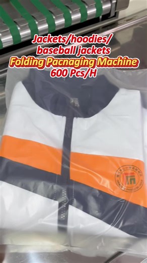 School Uniform Jacket Automatic Folding & Packaging Machine — 600 pieces per hour, folding and bagging in one seamless step.#foryoupage #clothesfoldingmachine #printedclothesfoldingmachine #sweaterfolding #ublmachine