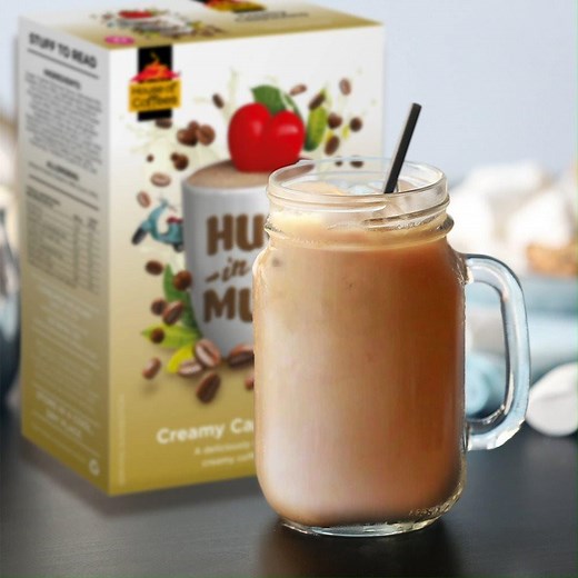Try this simple recipe for a creamy Iced Cappuccino ❄️ #HugLovers 1. Place a glass jar in the freezer for 30 mins and take it out just before you pour your coffee into it. 2. Prepare your Hug in a Mug Creamy Cappuccino with 50ml boiling water and allow to cool to a lukewarm temperature. 3. Carefully pour the coffee over into your jar and top it up with cold full cream milk and a couple of ice cubes. 4. If you're feeling indulgent, you can top it off with a scoop of vanilla ice cream or whipped c