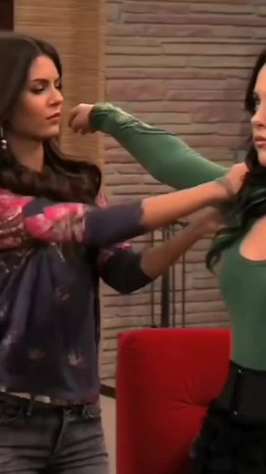 Physical Altercation Between Two Women in Room Setting