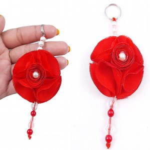 2.5K views · 41 reactions | keychains - Rose Shape Key chain Making | Easy Handmade keychain out of fabric | Rana Craft | Facebook