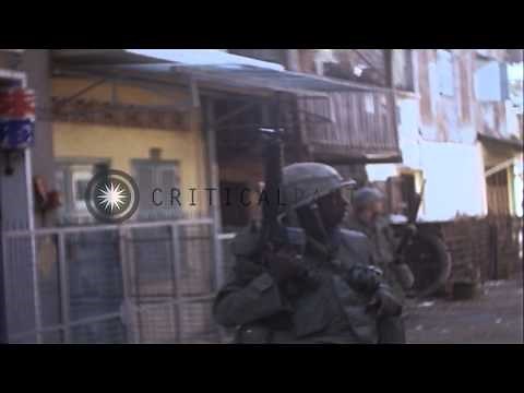 US Army 199th Light Infantry Brigade soldiers patrol in Saigon, Vietnam. HD Stock Footage