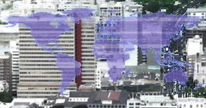 World map animation over cityscape with buildings and trees