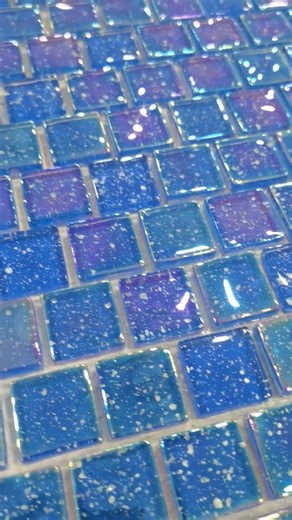Capture the ocean's shimmer with HOMEE Blue Iridescent Mosaics