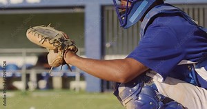 Baseball player catching a ball during a match