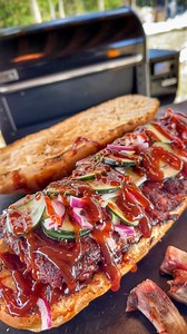 1.1M views · 14K reactions | Fired up the bbq season with rib sandwiches that mean business!The Weber Grill Searwood XL 600 and its SmokeBoost setting brought that deep, bold smokiness you can taste in every bite.Stacks on stacks of BBQ bliss. #WeberGrillsCA #NationBBQMonth #SmokeBoostOnPoint #WeberSearwoodXL600 #ad | GrillHunters | Facebook