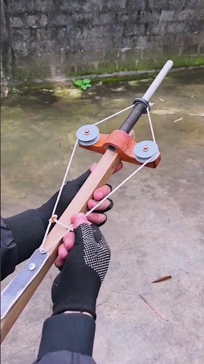 Spring crossbow on rollers 1