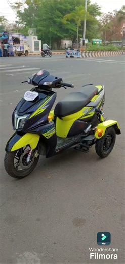 bajee and sons mobility TVs Ntorque 125cc modified for physically challenged people.