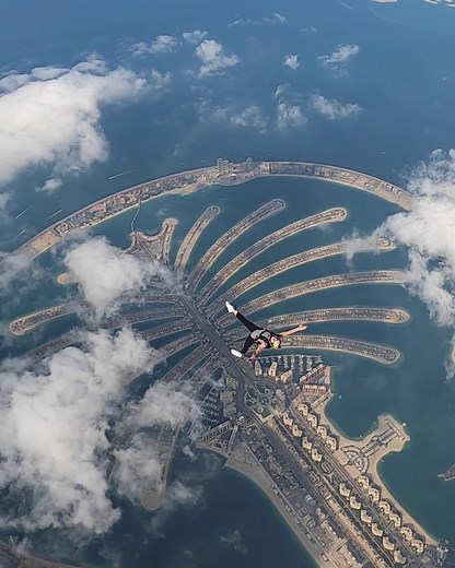2.2M views · 33K reactions | The Palm, Dubai has to be one of the most incredible places to skydive over . : Maja Kuczynska : @thegodshot & Chris Patz | Red Bull Adventure | Facebook