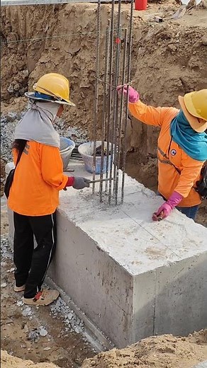 Technical Install column rebar on footing concrete of building