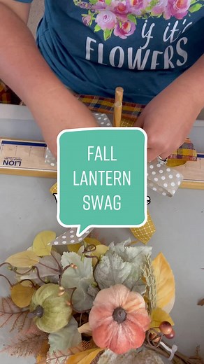 How to make a fall lantern Swag using pumpkin sprays and a handmade bow #falllantern #fallwreaths🍁 #fallwreathsoftiktok #fallfrontporchdecor #howtomakeawreath #teacherturnedentrepreneur #wreathmakersoftiktok