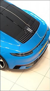 What do you think about this Shark Blue Porsche 911 Carrera 4?