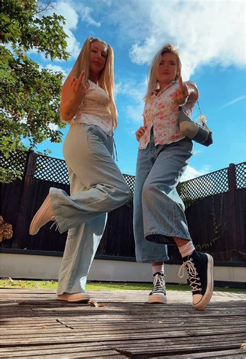 Girls Having Fun in Converse Shoes