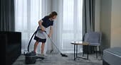 Pretty Woman Cleaning Room In Hotel, Lady With Vacuum Cleaner...