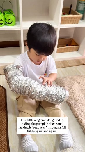 Through this imaginative routine, our buddy explored object permanence by understanding that the pumpkin still existed even when hidden. His pretend play allowed him to create a story filled with wonder and discovery, while his language development shone through as he expressed delight and narrated his magical performance. Each repetition became meaningful practice—strengthening his thinking, creativity, and communication skills. 💕 | The Playhouse Molino