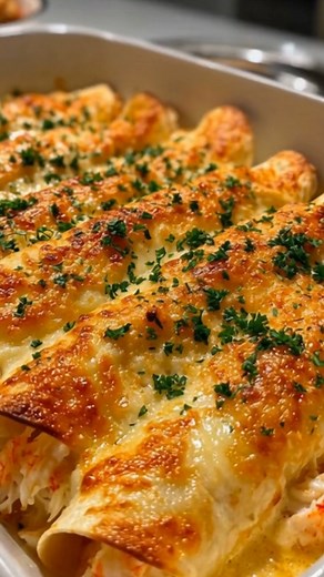 Cheesy Baked Seafood Enchiladas Creamy, cheesy, and loaded with shrimp and crab, these baked seafood enchiladas bring a coastal twist to a Mexican classic. Perfectly golden, bubbling, and irresistibly rich in every bite! RECIPE: 1 lb large shrimp, peeled and deveined 1 cup lump crab meat (fresh or thawed) 1 tbsp olive oil 2 tbsp butter 1 small onion, finely diced 2 cloves garlic, minced 1 jalapeño, seeded and minced (optional) 1/2 tsp paprika 1/2 tsp Old Bay seasoning Salt and pepper, to taste 1