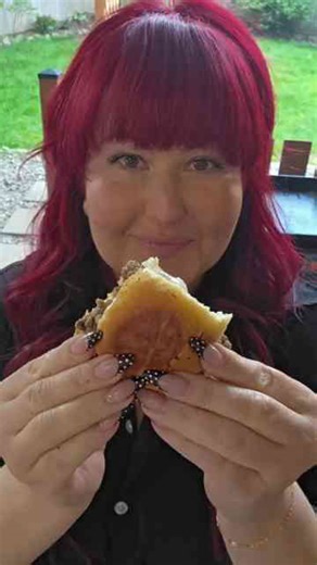 Cheesy ground beef sliders on the griddle with bold smash burger flavor