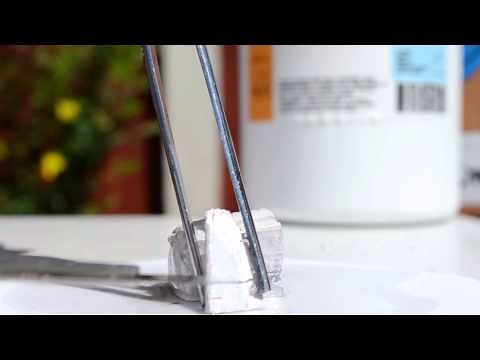 Sodium metal reacting with water vapour in the air