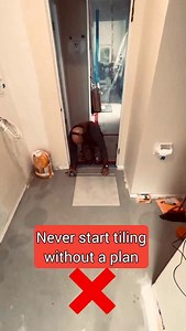 ✅ Follow Built To Code for more tips. If you want your floor tiles to look perfectly straight and professional, the first step is planning. Never start tiling without a plan — otherwise, you risk ruining the layout and having to redo it, or ending up with crooked tiles that will bother you every time you walk across the room. The best way to avoid this is by starting from the doorway. Find the main walking path and mark the center line with chalk. This ensures the tiles in the area that is alway