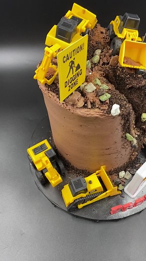 Excavation cake for Freddie’s 2nd Birthday! Chocolate sponges with chocolate buttercream filling and finish, Oreo and chocolate Flake mud, chocolate rocks and stones & a fleet of diggers, dumpers and mud movers - we even had flashing lights!! 💛 🎂#birthdaycake #birthdayboy #diggercake