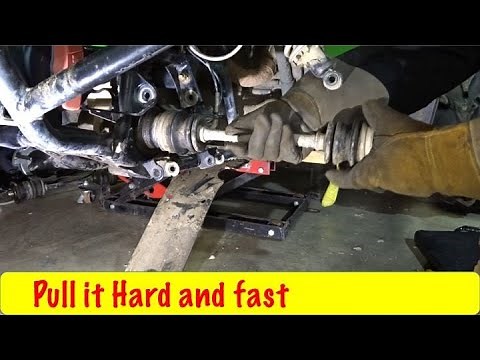 How to Remove a ATV Axle
