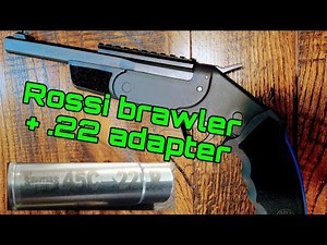 Rossi brawler with .22 caliber adapter from the shooter's box , shooting pumpkins at KEYFARM.