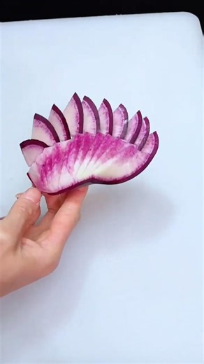 This radish can be made into an art form! #EasyToLearn #PlateDecoration #FruitAndVegetableStyling