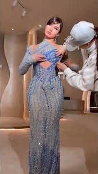 To order this blue ombré dress DM A captivating blue ombré gown designed in a sculpted,