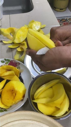 Preparing Fresh Mango Pieces 🥭