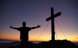 Christians stand together and recite the Lord's Prayer