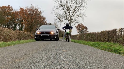 Volkswagen Golf GTI races against Kawasaki KX85