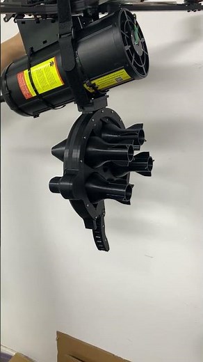 Rotating throwing device of fiber-optic unmanned aerial vehicle