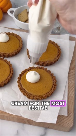 These mini pumpkin cheesecake tartlets are the cutest holiday dessert. Creamy filling, cinnamon graham crust and the perfect fall spice. Crust 1 3/4 c graham crumbs (213 g) 2 tbsp sugar 1/2 tsp cinnamon Pinch salt 5 tbsp butter melted (70 g) Filling 8 oz cream cheese (226 g) 1/4 c light brown sugar (50 g) 2 tbsp sugar (25 g) 1 1/2 tsp cornstarch 1 tbsp sour cream (15 g) 1 tsp pumpkin pie spice 3/4 tsp cinnamon 3/4 tsp vanilla Pinch salt 1 egg 1/3 c pumpkin puree Method Bake crust at 350F 10 to 1