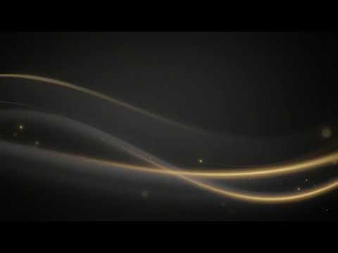 Abstract flowing gold light waves on dark background