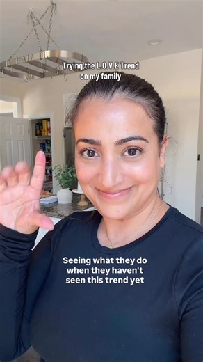 Lalleh Jennings • Parenting Laughs on Instagram: "Happy Valentines Day! #momlife #parenting #lifewithkids #momsofinsta I got nervous with the E so I slapped her hand away thinking it was turning inappropriate but she was trying to make this: 🤟 lol. Oops 😅"