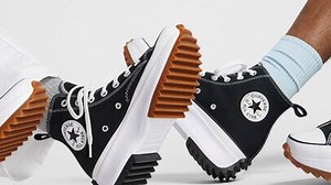 These Platform Sneakers Will Take Your Outfit To New Heights | Essence