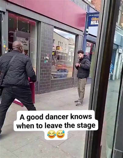 Two British men tested their fighting skills on a London street. One quickly retreated after realizing he was no match for his opponent.