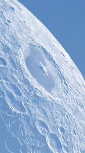 An unusual object appears near the Moon surface during observation, making it look mysterious at first. In most cases, such sightings are caused by a space rock, satellite, aircraft, or debris passing between the camera and the Moon. Because the Moon has no atmosphere, objects crossing in front of it look very sharp and clear. High zoom, distance, and viewing angle can create a strong optical illusion, making the object seem closer to the Moon than it really is. This can make normal space object