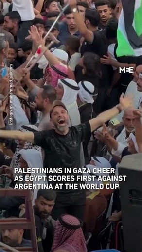 Palestinians in Gaza celebrate Egypt's opening goal against Argentina at the World Cup