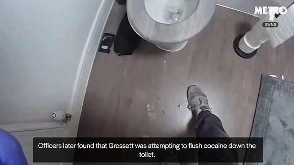 Moment police officer kicks down door to find drug dealer sitting on toilet