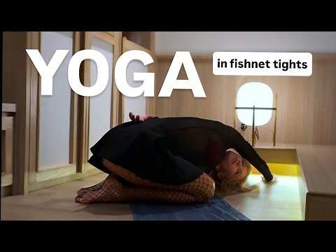 Yoga stretching in fishnet tights