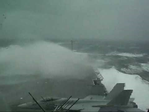 CV63 aircraft carrier in storm