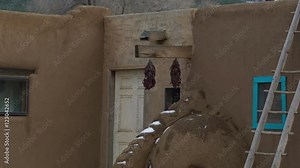 Tracking Shot of Traditional Indian House in Taos Pueblo, NM -Tilt Down Zoom Out